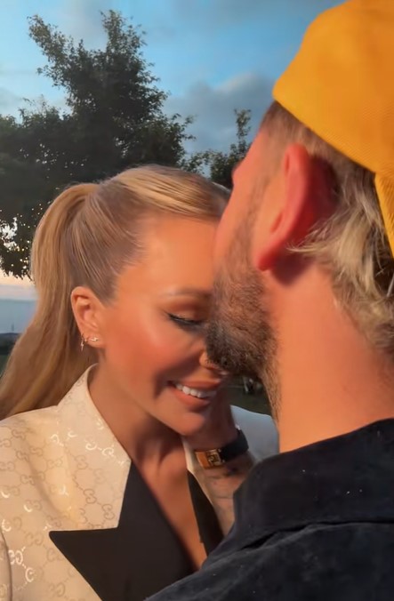 Olivia Attwood and a man embracing.