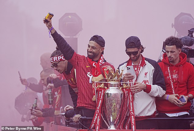 Mohamed Salah waved to supporters who cheered him and his team-mates earlier in the day