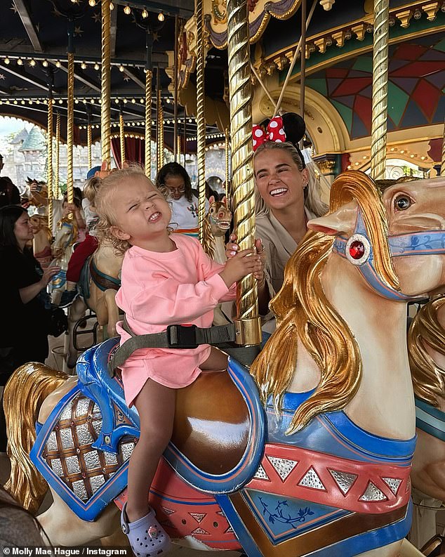 She also shared adorable snaps with daughter Bambi as they rode the merry-go-round together