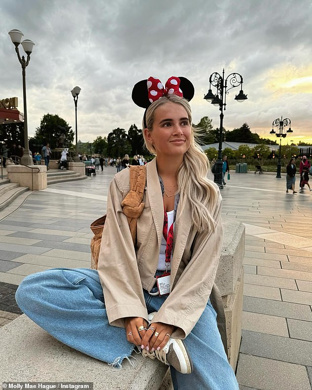Molly looked stylish in a beige cropped jacket and blue denim jeans which she teamed with Minnie Mouse ears as she wandered around the park
