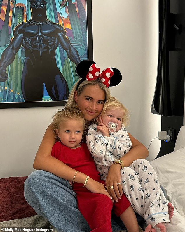 The star beamed as she cuddled Bambi and a friend