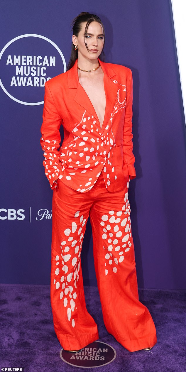 German DJ Sophie Hawley-Weld decided to wear a bright orange suit with a jaguar printed across it in white, but the ensemble's dramatic coloring was a little too much