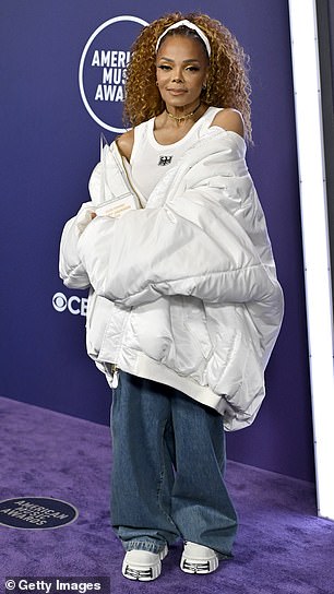 Janet Jackson - who accepted the Icon Award at the event - strutted on the red carpet wearing a white tank top as well as a pair of baggy denim jeans from Vetements Official