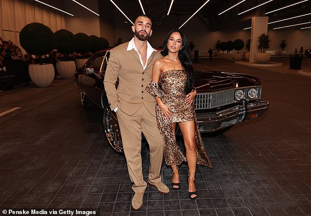 The beauty paused for photos with fellow singer Manuel Turizo - whom she recently collaborated with on the track Que Haces which dropped earlier this month