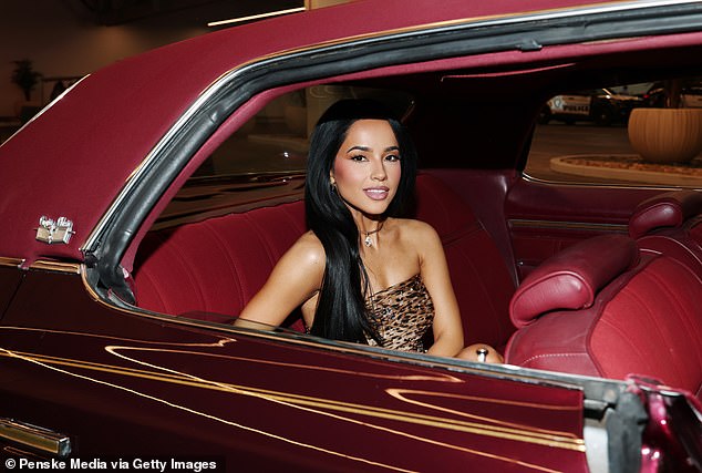 While at the newly-constructed hotel in the heart of Las Vegas, Becky G was seen posing inside a vintage car that was parked outside
