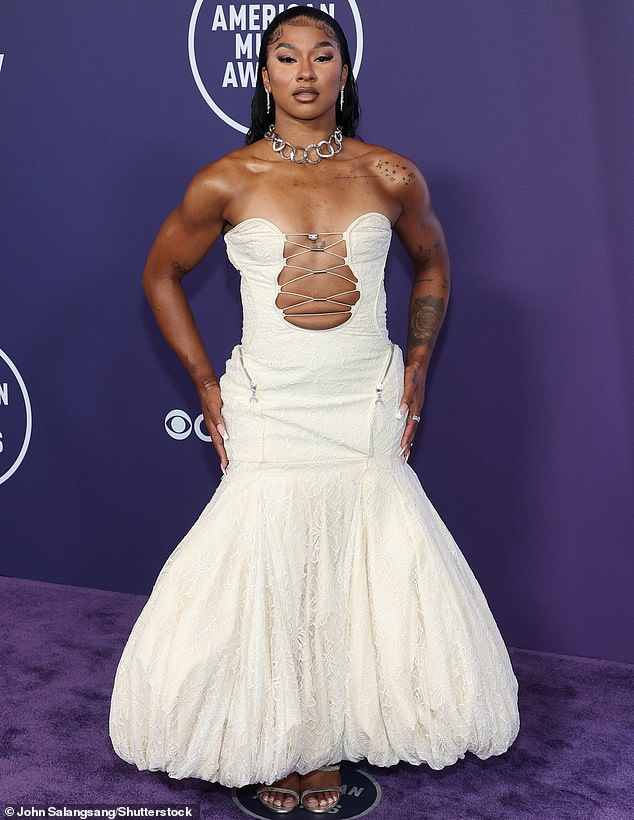 U.S. gymnast Jordan Chiles dressed in a strapless white gown from Marine Serre with large cutouts on the front