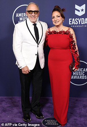 The couple - who tied the knot in 1978 - cozied up together on the red carpet as they posed for snaps together ahead of the main ceremony