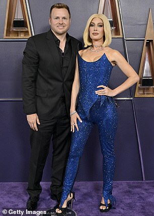 The Hills alum slipped into a pair of open-toed, black platform heels and further glammed up the look with eye-catching necklaces as well as sparkling bracelets and rings