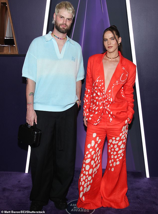 She was also joined by her musical partner Tucker Halpern who was stylish in a light blue shirt as well as baggy, black pants