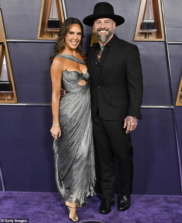 She accompanied Zac Brown to the festivities who dressed for the occasion in a black suit and black dress shirt