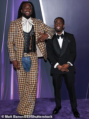 Shaboozey towered over Cenat and humorously crouched down in one image which caused the media personality to burst out laughing
