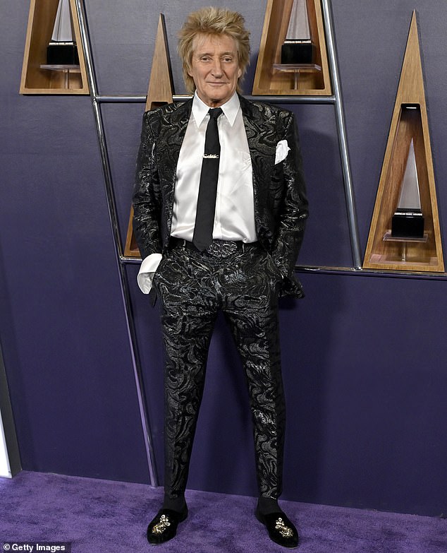 Rod Stewart - who was honored with the Lifetime Achievement Award - was dressed for the occasion in a fashionable black suit