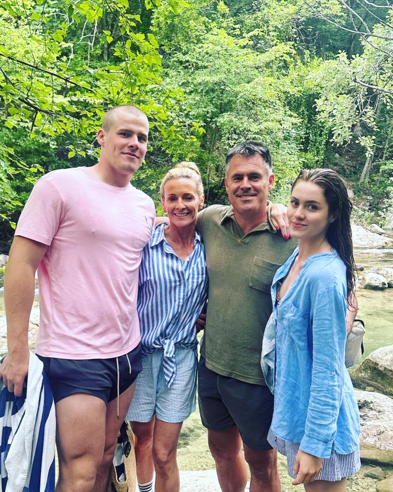 Gabby Logan, her husband Kenny, and their twins Reuben and Lois posing for a photo.