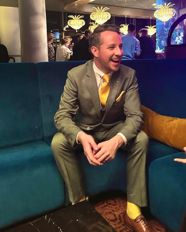 Max Fox, Britain's Got Talent, sitting on a teal couch.