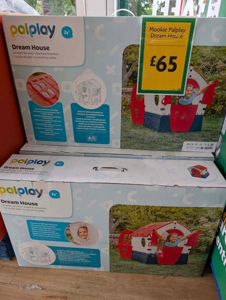 Two boxes of a Palplay Dream House children's playhouse, one showing the price of £65.