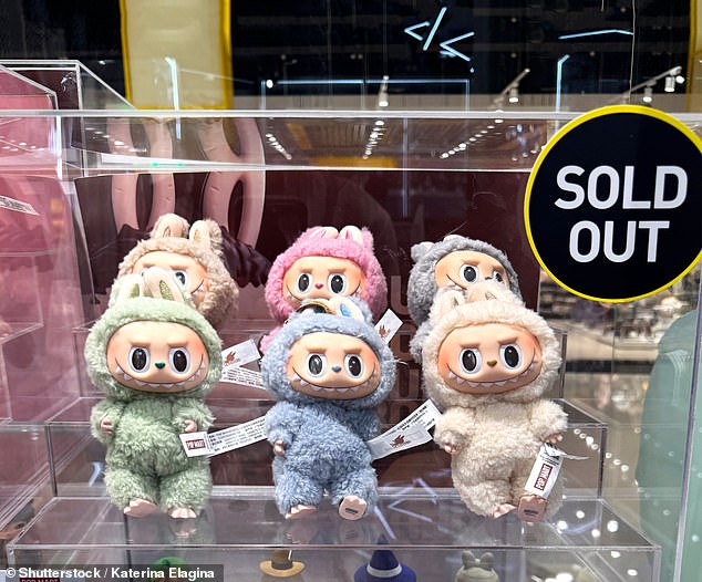 The elf-like plush toys, created by Hong Kong artist Kasing Lung, are described as having a playful yet fierce look thanks to their wide eyes, sharp teeth, and pointed ears (pictured: Labubu stock image)