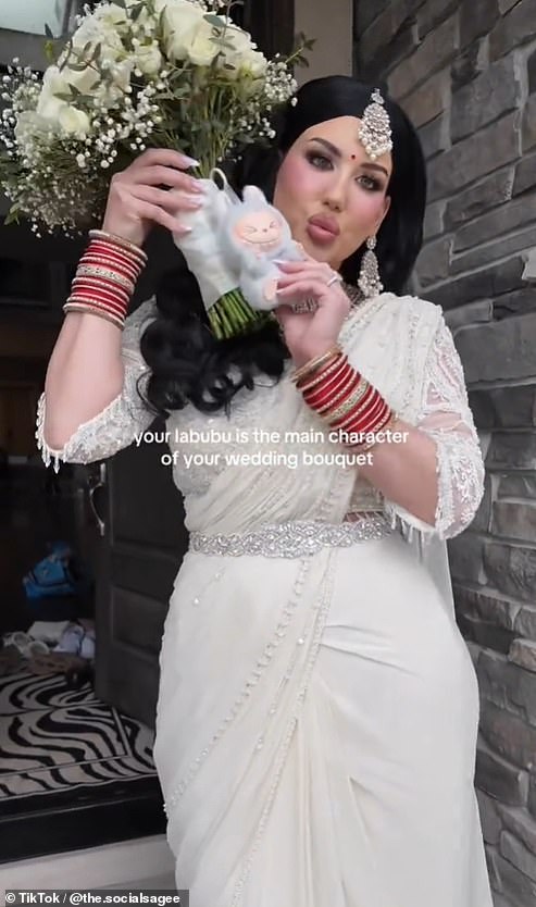 A Toronto-based bride (pictured) took it a step further and decided to include her Labubu into her big day by attaching the lavender-coloured figurine to her wedding bouquet