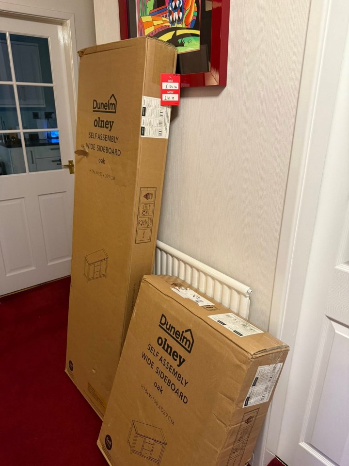 Two flat-pack Dunelm Olney oak wide sideboards in their boxes.
