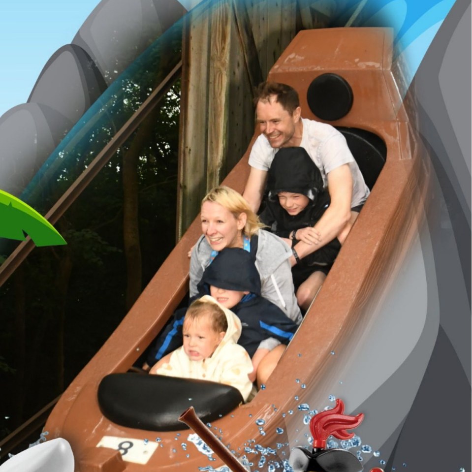 Family riding a log flume ride at Legoland.