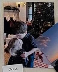 She also gave fans a sweet glimpse of Prince Archie and Princess Lilibet with a photo of Archie giving his little sister a kiss on her forehead during Christmas 2022