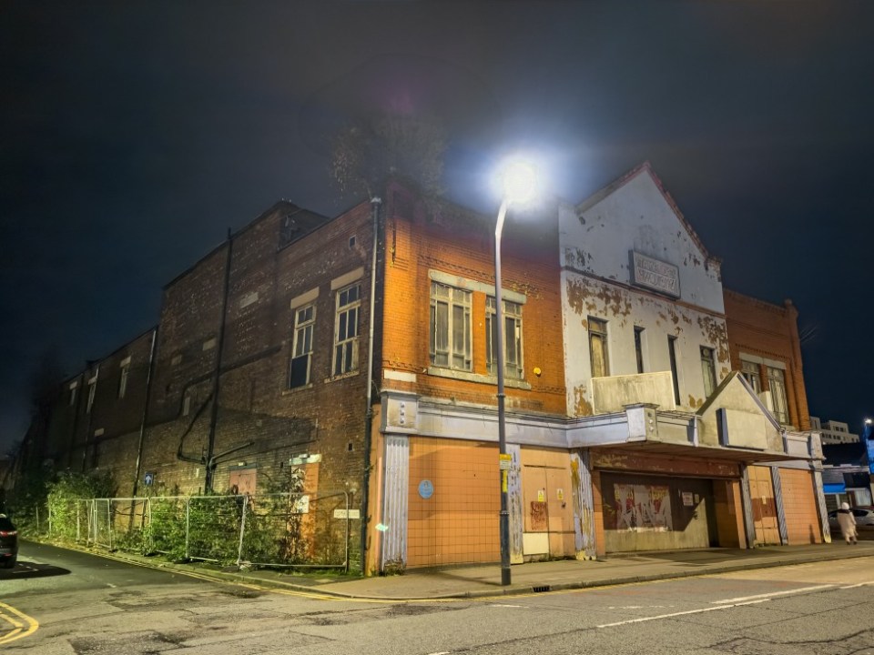 Abandoned Ashton Hippodrome in Manchester at night.