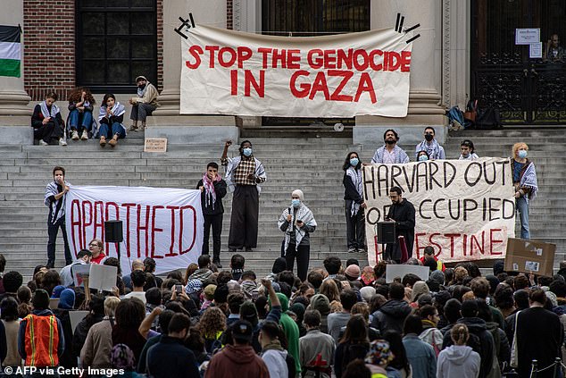 The president and his Republican allies have claimed that Harvard is 'antisemitic' for allowing pro-Palestinian protests to take place on campus (pictured: a Harvard protest in October 2023)