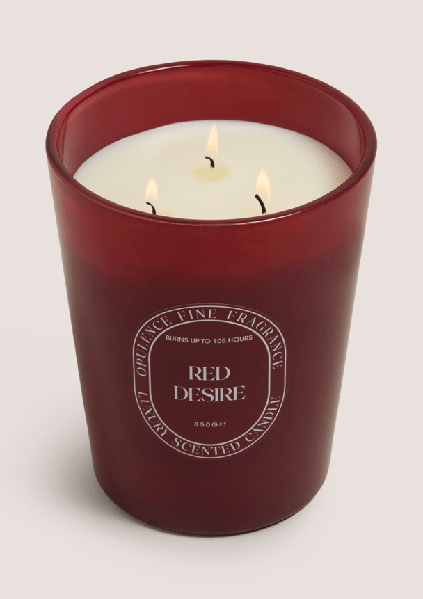 Red Desire candle burning.