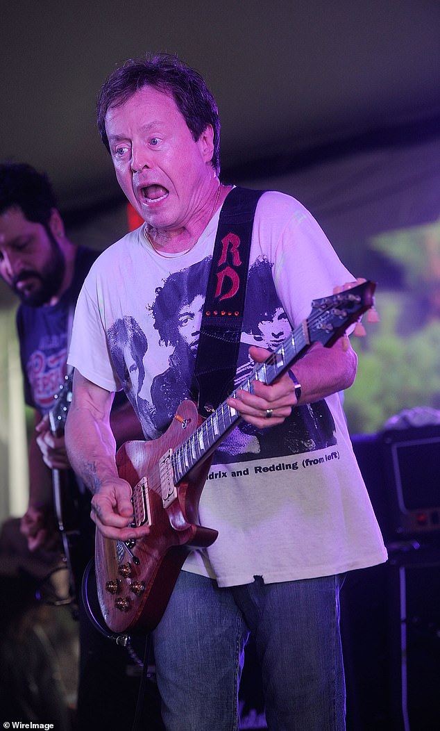 He was also famous for writing Rock and Roll Hootchie Koo — an iconic song that was used in season four of Stranger Things — and Hulk Hogan's Real American wrestling theme song; pictured August 2012 in New York City