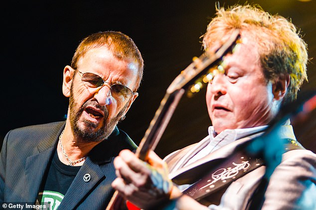 In recent years, he had toured across the world with Ringo Starr's band; pictured with Ringo Starr in November 2011 while performing in Sao Paulo, Brazil