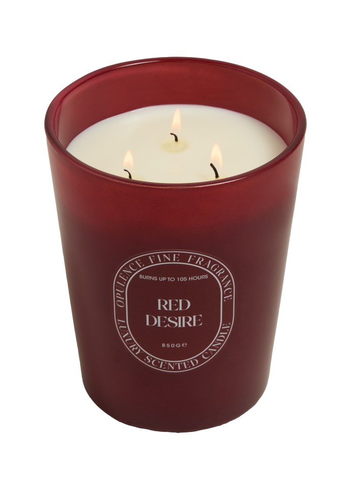 Red Desire candle burning.