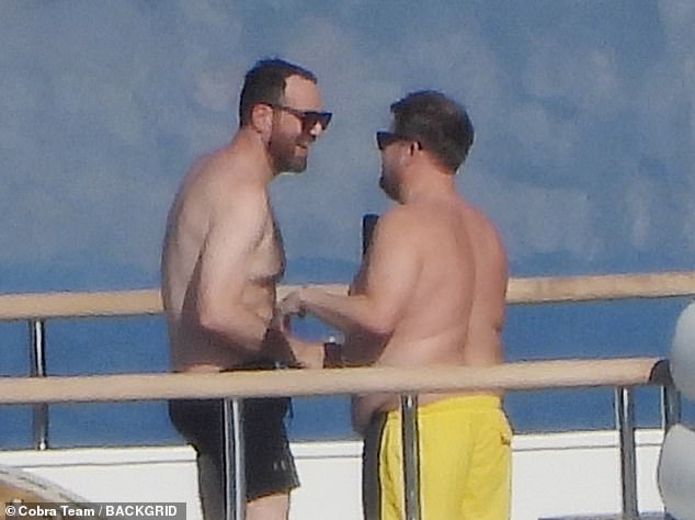 The presenter shared a joke with another member of his group during Sunday's outing