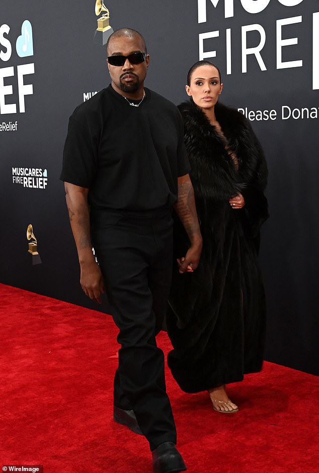 Just recently, she faced backlash after baring her breasts in a see-through top, much like this week's post, during a public outing in Spain with the rapper; pictured February in Los Angeles