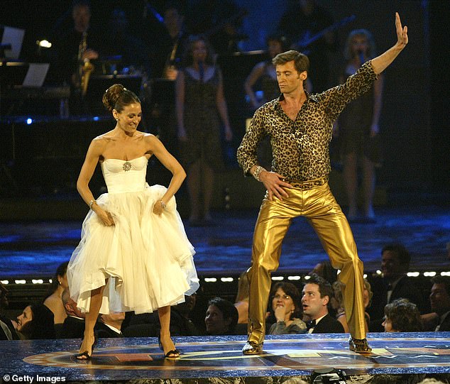 While both Hugh and his ex-wife Deborra-Lee Furness have long maintained that he is straight, their 2023 divorce prompted yet more speculation. (Sarah Jessica Parker, left, and Hugh Jackman in 2004 at the Tony Awards).