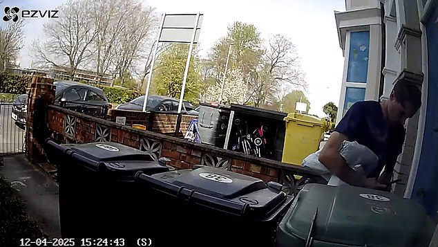 A delivery driver was spotted placing a cardboard box and one of the packages on the doorstep before snapping a pic
