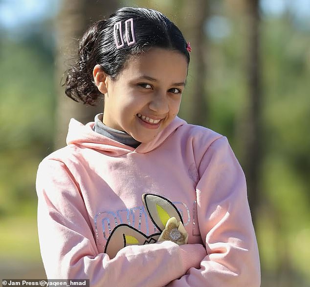 In one of her final posts, Yaqeen wrote: 'Today was a day of joy for Gaza¿s orphans ¿ we were giving them new clothes to bring a little happiness.'