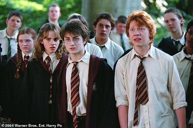 Emma Watson (left) played Hermione in the original films, Daniel Radcliffe (centre) starred as Harry Potter and Rupert Grint (right) featured as Ron Weasley [Pictured in Harry Potter and the Prisoner of Azkaban]