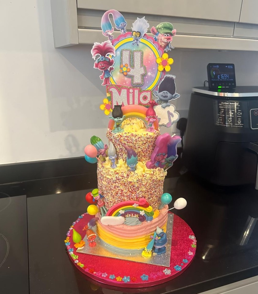 Two-tiered Trolls-themed birthday cake for Mila's 4th birthday.