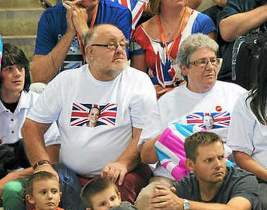 Ellie Simmonds' adopted parents, Val and Steve, wearing shirts with a Union Jack and Ellie's image.