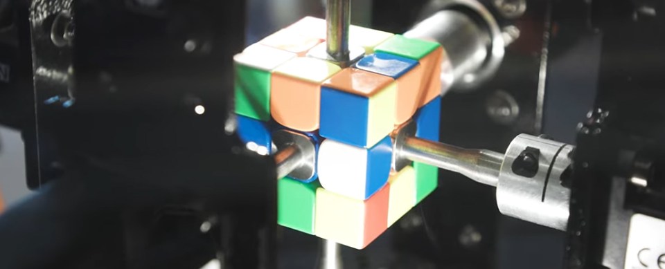 A robot solving a Rubik's Cube.