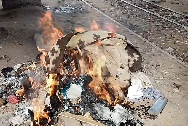 All of her belongings were burnt (above) after she was robbed in Peru