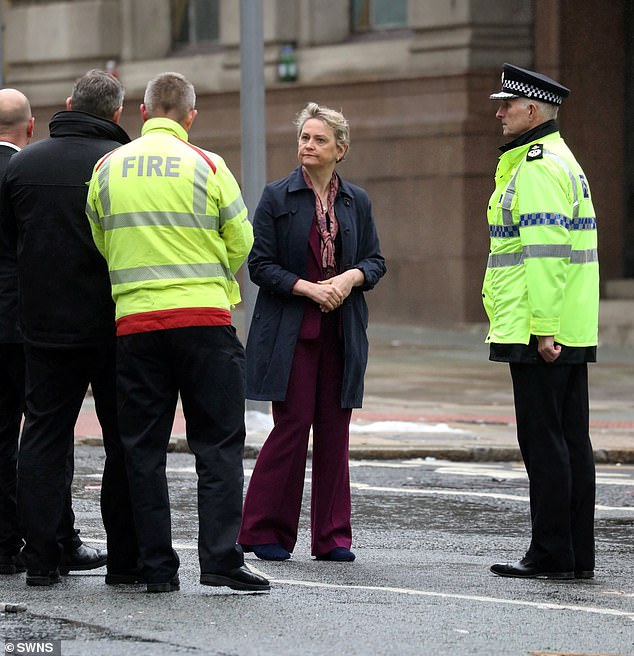 Home Secretary Yvette Cooper visits the scene on Water Street in Liverpool, where a car hit pedestrians at Liverpool FC's Premier League victory parade