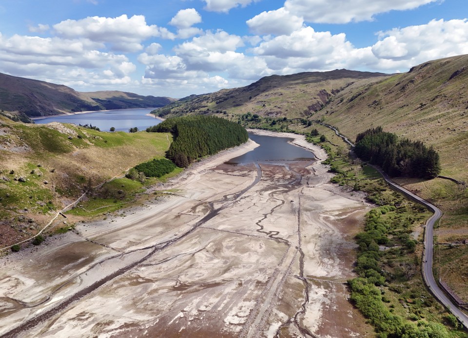 Aerial view of Haweswater reservoir in Mardale, Cumbria, showing low water levels revealing the flooded village.