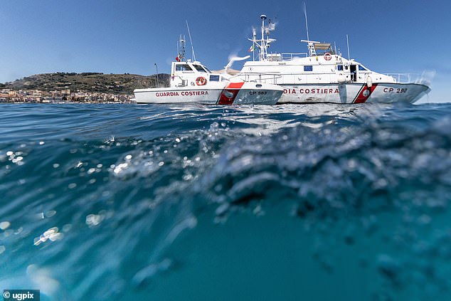 Coastguard vessels off the coast of the Sicilian fishing village of Porticello from which divers have been examining the wreck of the Bayesian
