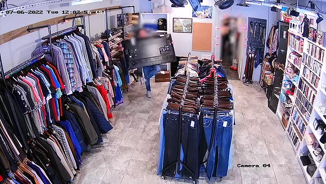 It is not the first example of criminals targeting charity shops. This footage shows a thief walking out of a children's charity store in West London with a TV