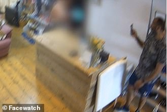 The woman (who has been pixelated in CCTV supplied to MailOnline) walks behind the shop counter to confront Mr Jarvis-Mack
