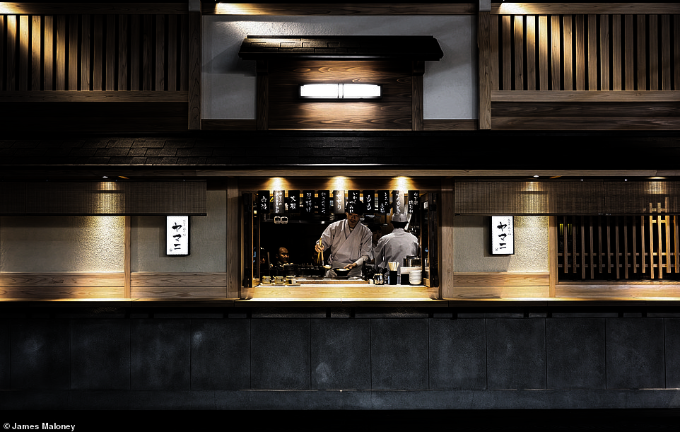 James Maloney took this incredible photo in the Shimbashi district of Tokyo. He says: 'The bustling streets are alive with the sizzle of fresh ingredients, the inviting aromas wafting through the air, and the vibrant colours of beautifully plated dishes'