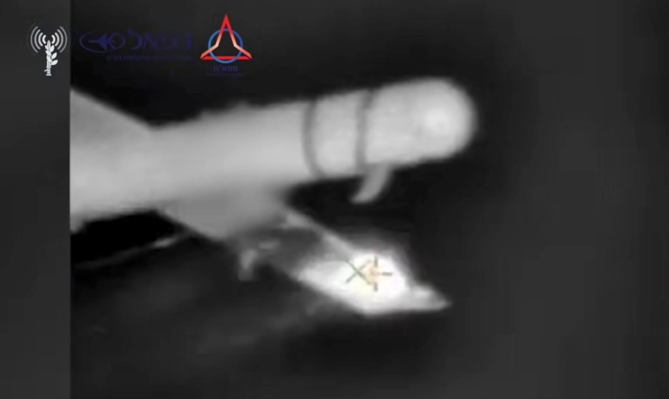 Israel's laser defense system intercepting a rocket.