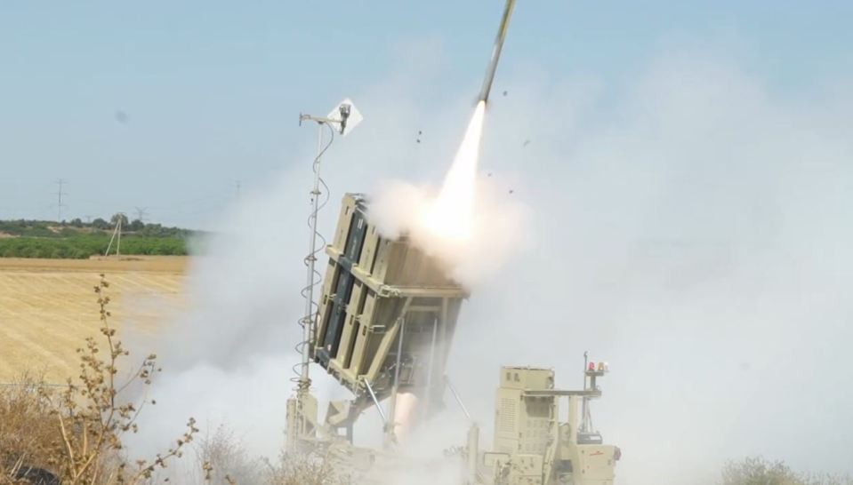 Iron Dome battery system launching a missile.