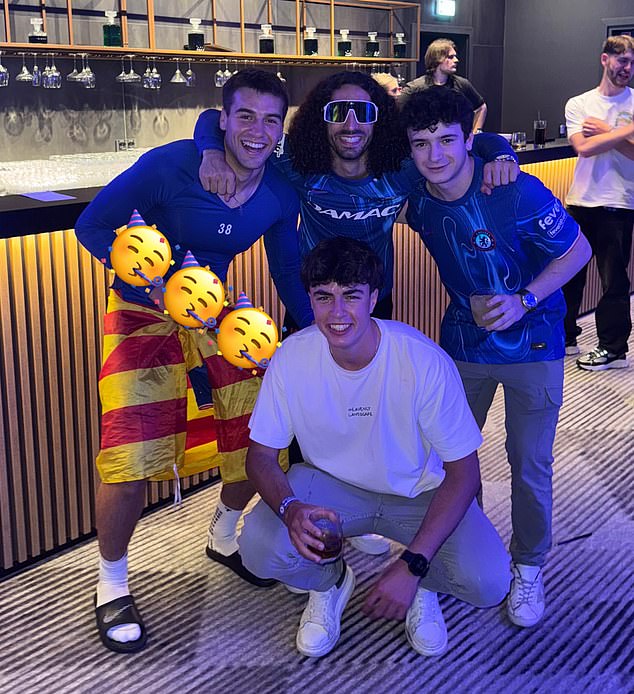 Marc Guiu, left, and Marcu Cucurella got into the party spirt following Chelsea's success