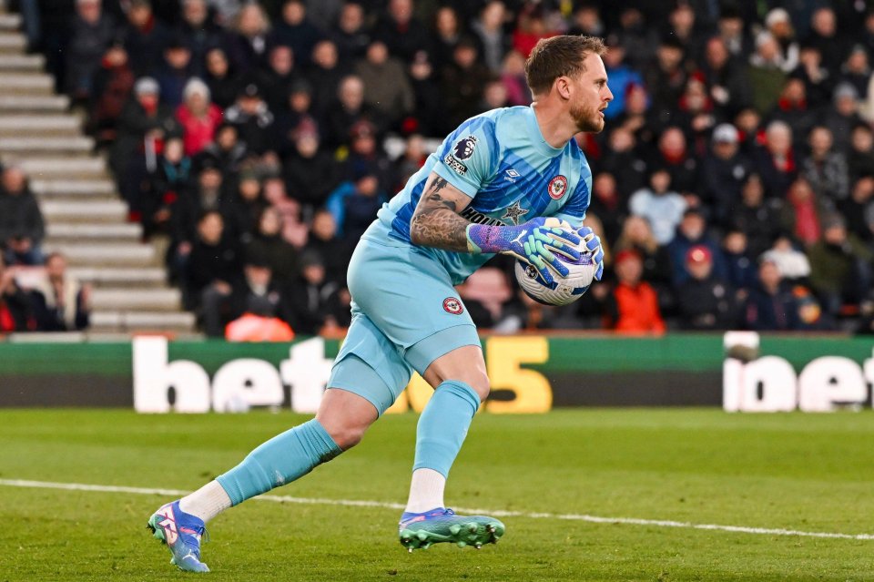 Brentford goalkeeper Mark Flekken making a save during a Premier League match.